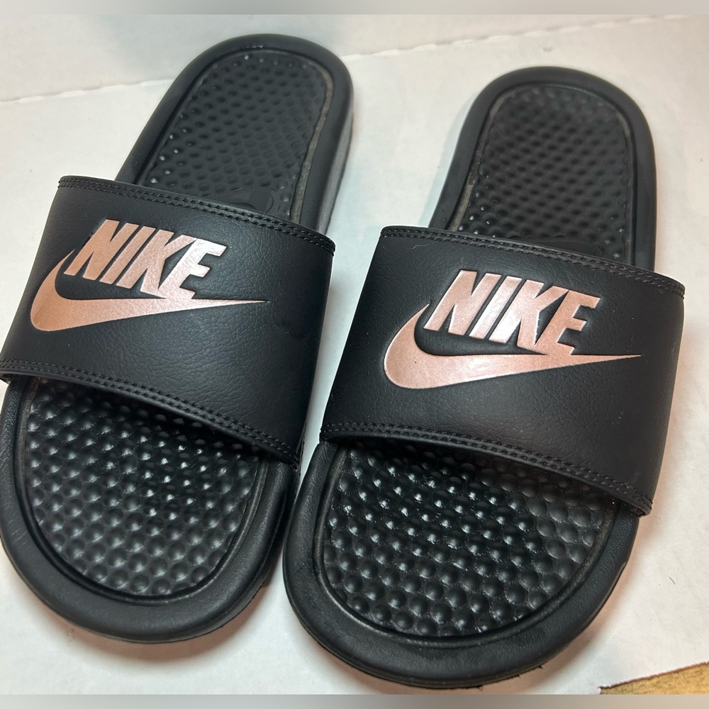 Nike Black Slides with Metallic Accents